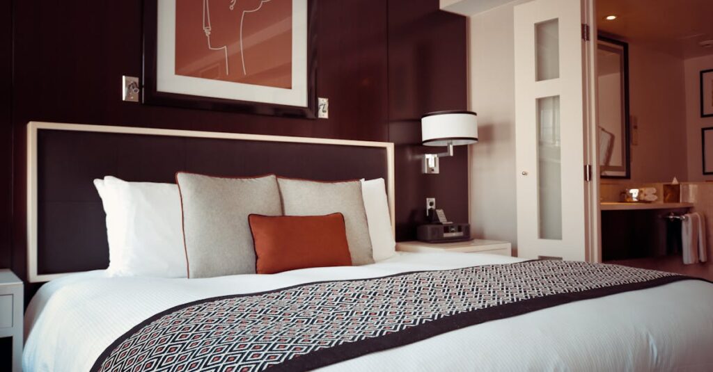 Cozy and modern hotel bedroom interior with elegant decor and soft lighting.